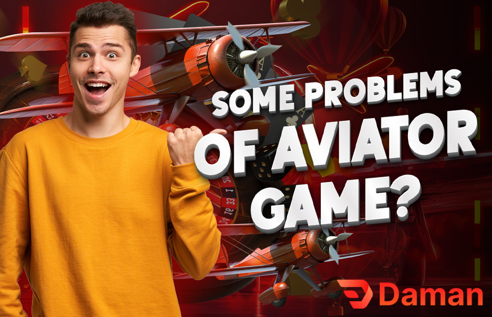 A picture of a man holding a cellphone showing a common problem in the Aviator Game.